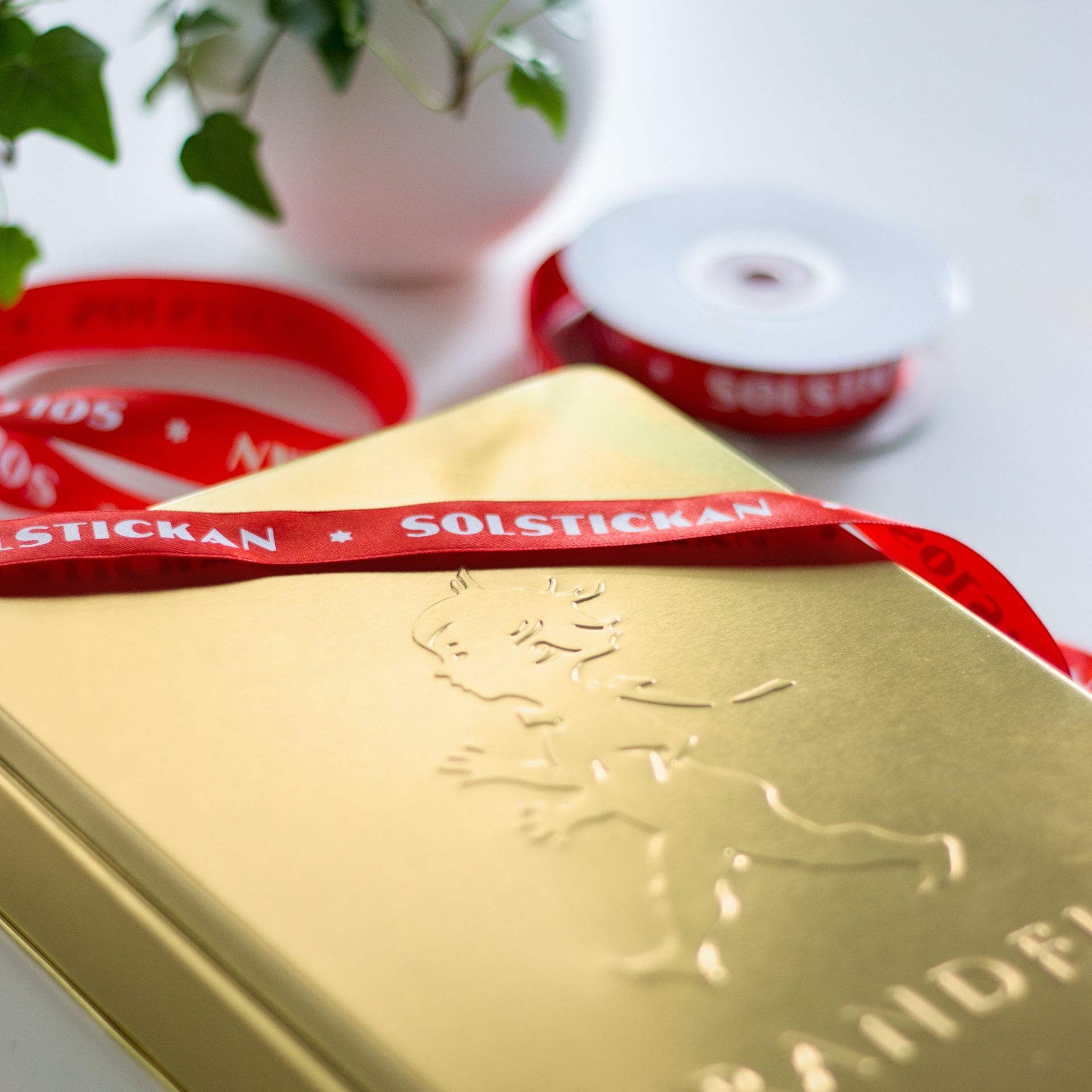 GOLD SOLSTICKAN